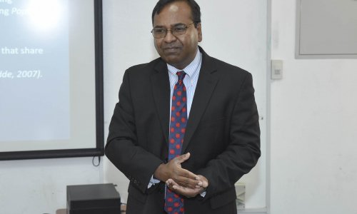 A Seminar on “Global Business and New Challenges” at AAU