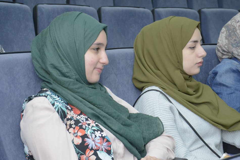 Engineering faculty staff meeting with students