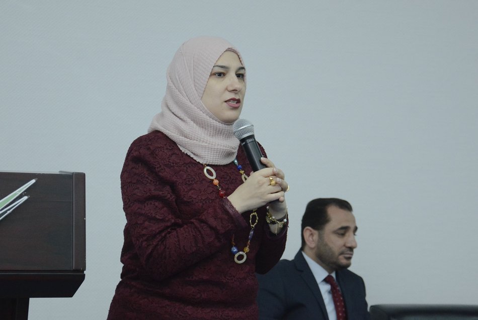 Engineering faculty staff meeting with students
