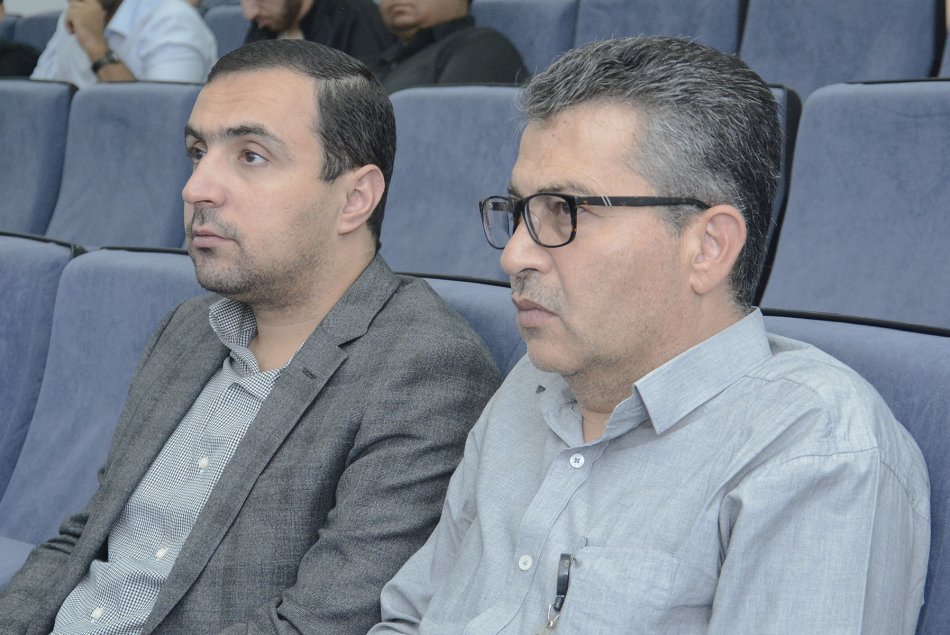 Engineering faculty staff meeting with students